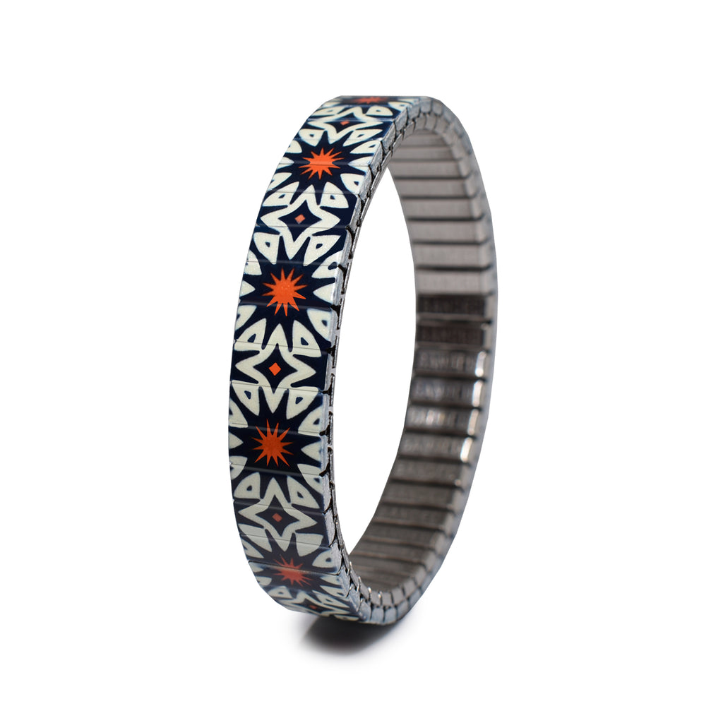 The Individualist - The Saul Bass - 10mm Classic Finish   The Individualist is  new collection for Spring Summer 2022.  Big, bold & unafraid to make a statement. Take a walk with us as we explore and break down the psychology of shapes in a modern world with these vintage graphic design inspired patterns