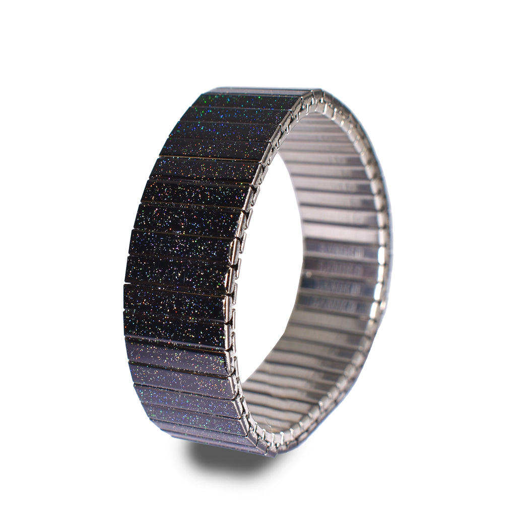 The Cosmos✨ - 18mm - Black Rainbow Metallic finish  Hallo unendlicher Raum. Wir haben die Sterne des Universums eingefangen und dieses besondere Regenbogen-Metallic-Schwarz Banded geschaffen. Dynamisch, tiefgründig und atemberaubend. Funkelnder Glanz zu 100%, die ganze Zeit. Tanzen Sie mit dem Kosmos um Ihr Handgelenk, heute Abend 🪐