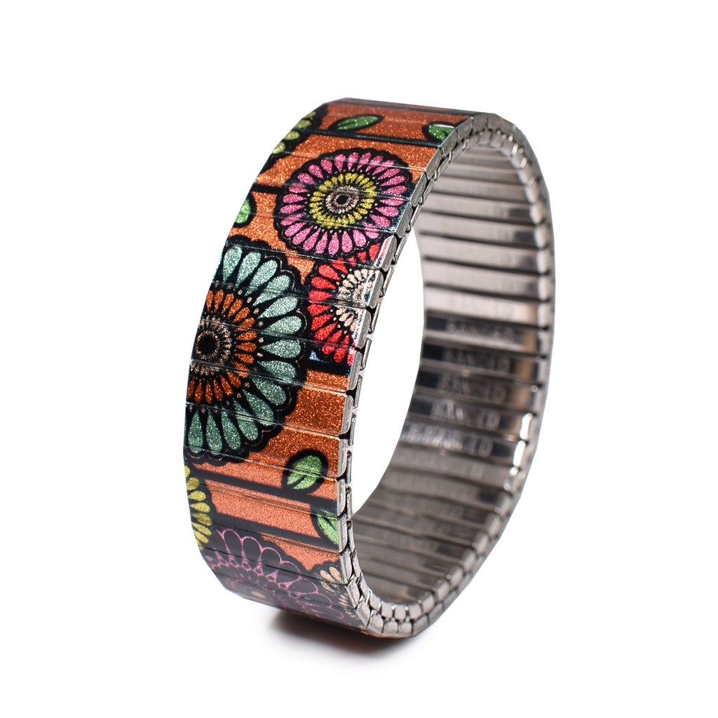 Flora Atomica - Jardin de Tulipes - 18mm - Metallic Finish  Ein Strauß in Pariser Farben mit einem funkelnden Hintergrund in Orange. Eine Hommage an unseren Lieblingspark im Herzen von Paris, den Parc des Buttes-Chaumont.