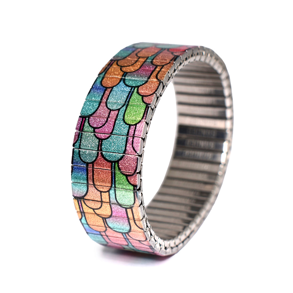 Metropolis - Sunset Sherbert Euphoria - 18mm Metallic Finish  Im Rausch der Nacht verfliegt die Zeit. Steig ein in das Karussell der Bühnen und Shows und lass dich von der Magie des Augenblicks mitreißen.