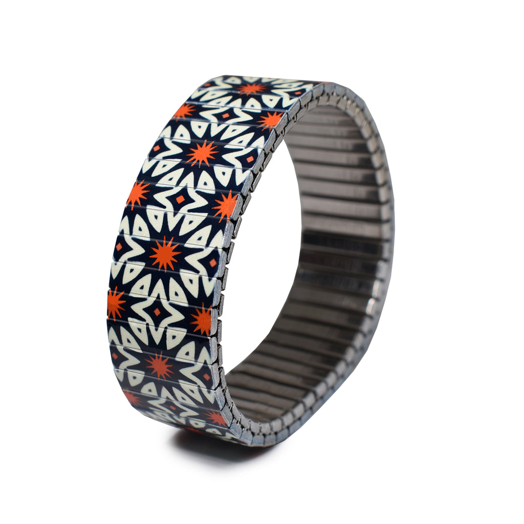 The Individualist - The Saul Bass - 18mm Classic Finish   The Individualist is  new collection for Spring Summer 2022.  Big, bold & unafraid to make a statement. Take a walk with us as we explore and break down the psychology of shapes in a modern world with these vintage graphic design inspired patterns