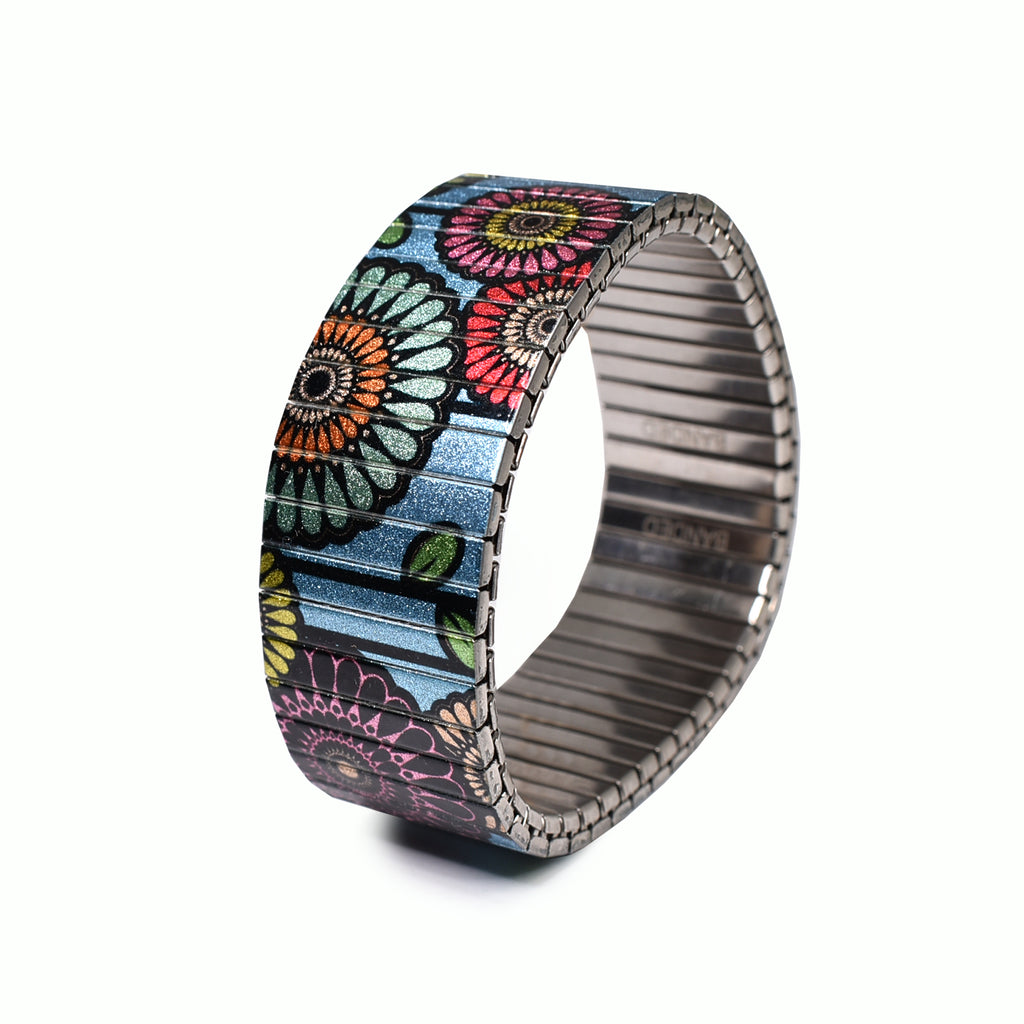 Flora Atomica - Le Train Bleu - 10mm - Metallic Finish  Ein Strauß in den Farben von Paris mit einem funkelnden himmelblauen Hintergrund. Eine Hommage an die Dekadenz eines unserer beliebtesten Gourmet-Stopps im Gare de Lyon.