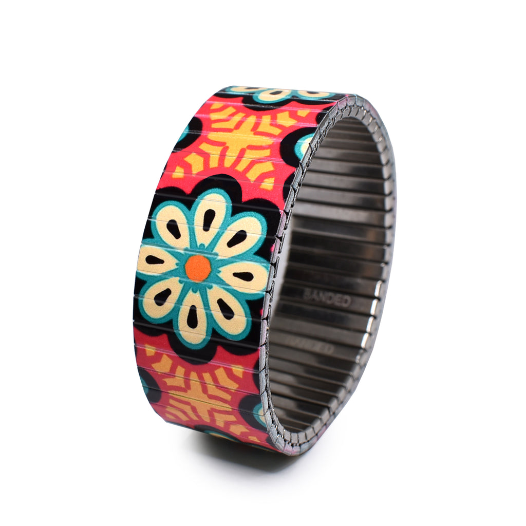 The Individualist - Flower Power - 23mm Classic Finish   The Individualist is  new collection for Spring Summer 2022.  Big, bold & unafraid to make a statement. Take a walk with us as we explore and break down the psychology of shapes in a modern world with these vintage graphic design inspired patterns