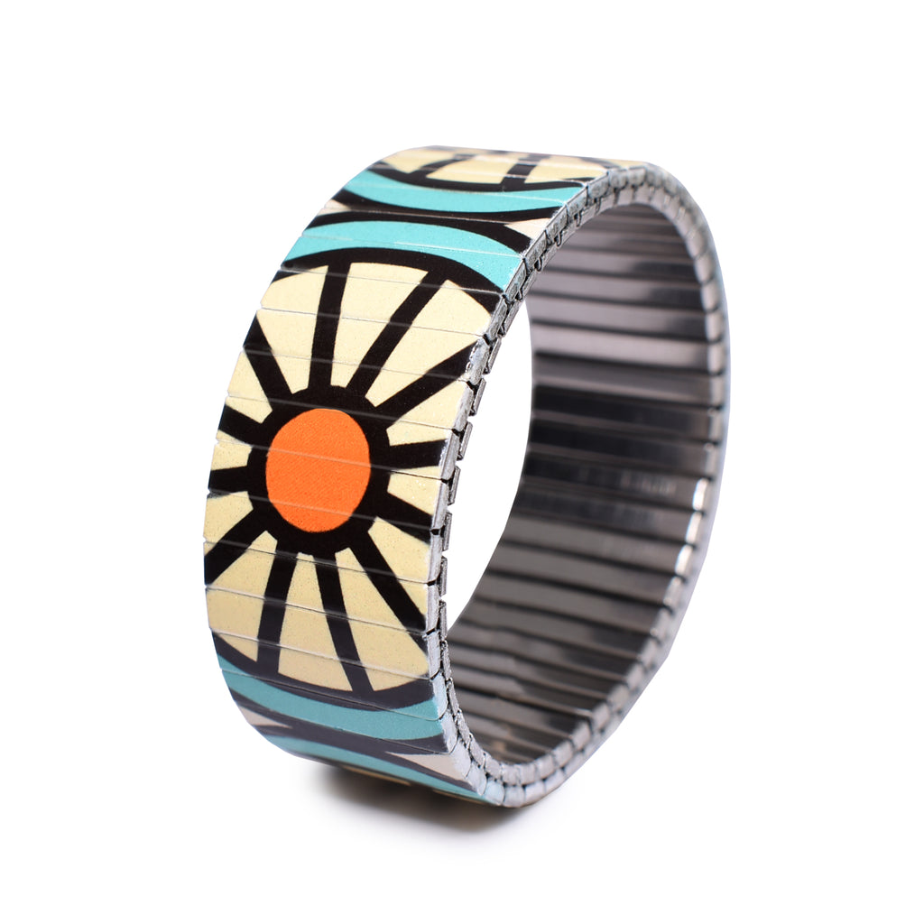 The Individualist -  Tajine - 23mm Classic Finish  Big, bold & unafraid to make a statement. Take a walk with us as we explore and break down the psychology of shapes in a modern world with these vintage graphic design inspired patterns.