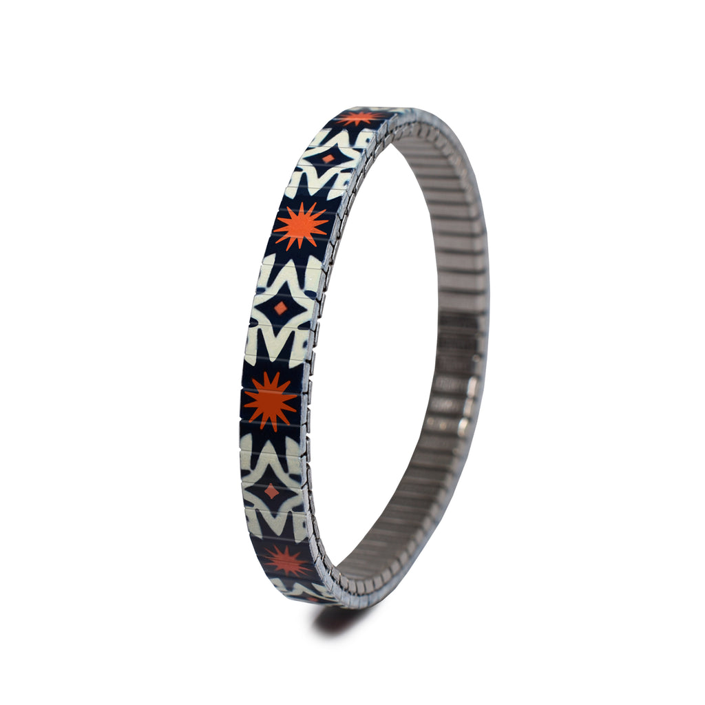 The Individualist - The Saul Bass - 6mm Classic Finish   The Individualist is  new collection for Spring Summer 2022.  Big, bold & unafraid to make a statement. Take a walk with us as we explore and break down the psychology of shapes in a modern world with these vintage graphic design inspired patterns