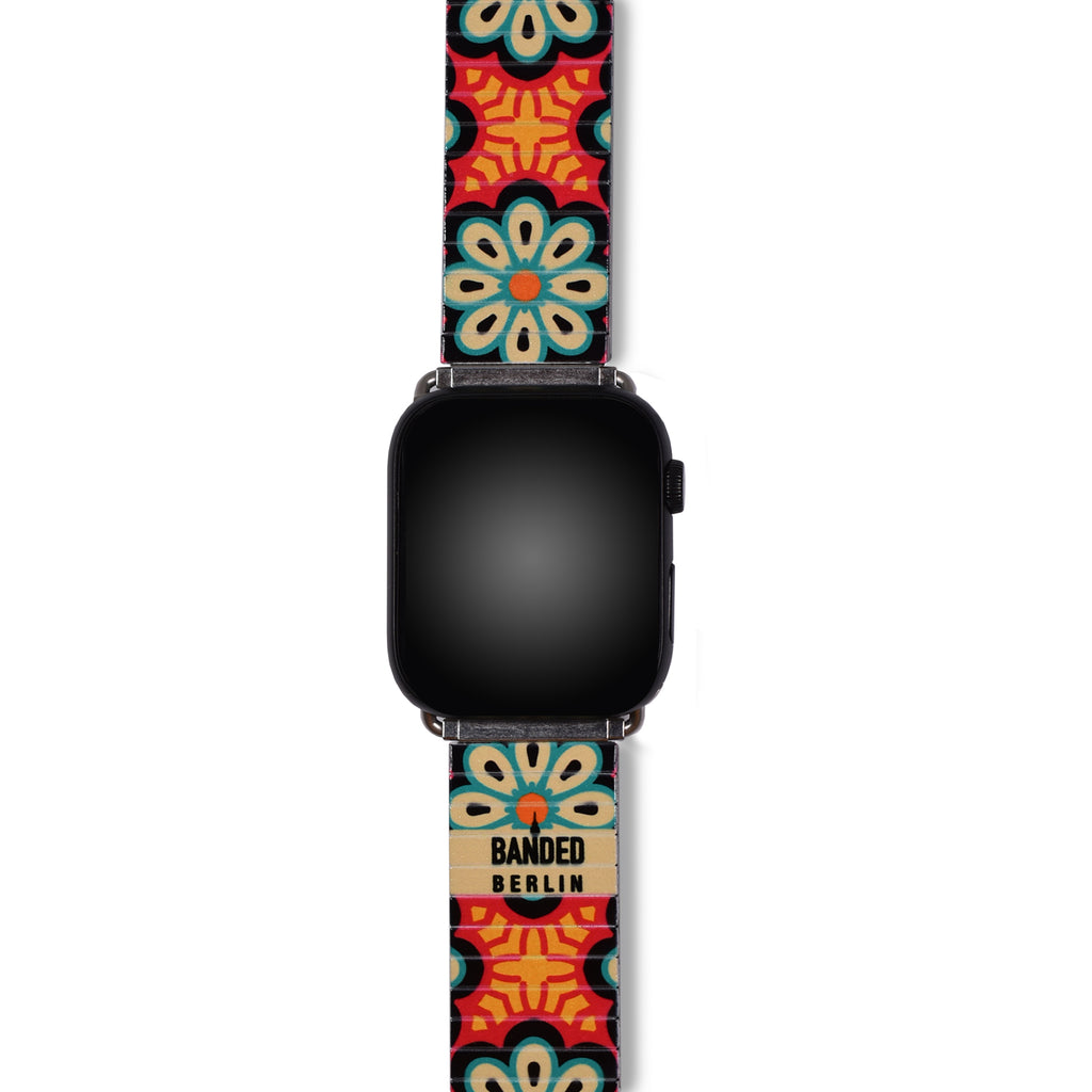 The Individualist - Flower Power - Banded for Apple Watch - Classic Finish  Big, bold & unafraid to make a statement. Take a walk with us as we break down the psychology of shapes in a modern world with these vintage graphic design inspired patterns.