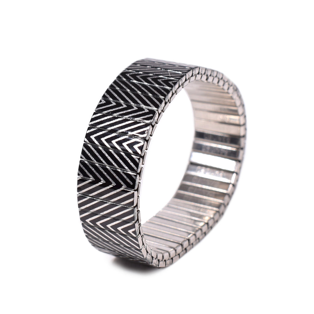 New to the Black n whites collection, this metallic version of the "Slowdive Revers" Banded says it all. Attitude never looked so symmetrically gorgeous. Show those punk kids who's the boss.  By Banded Berlin bracelets 2020