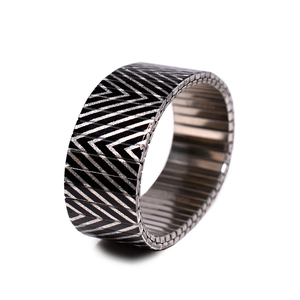 A mainstay in our black and whites collection, this metallic version of the "Slowdive Revers" Banded says it all. Attitude never looked so symmetrically gorgeous. Show those punk kids who's the boss. Now available in our signature 23mm king size width. 