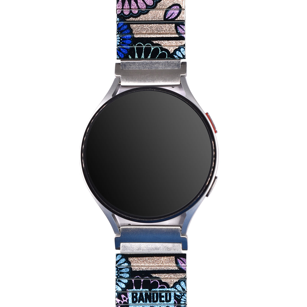 Flora Atomica - La Coupole - Banded™️ for Smart watch - Metallic Finish  Ein Strauß in den Farben von Paris, verziert mit einem glitzernden Hintergrund in Golden Peach. Eine Hommage an eines unserer Lieblingsrestaurants in Paris, La Coupole.
