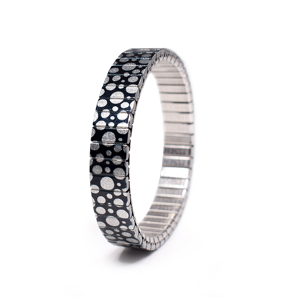 More Bubbles, Honey - Metallic version An OG, “More Bubbles, Honey” is one of our earliest patterns and a sentimental favorite. Illuminated moon bubbles floating in outer space. A playful style for those of us who feel like squares and need the night lighted.