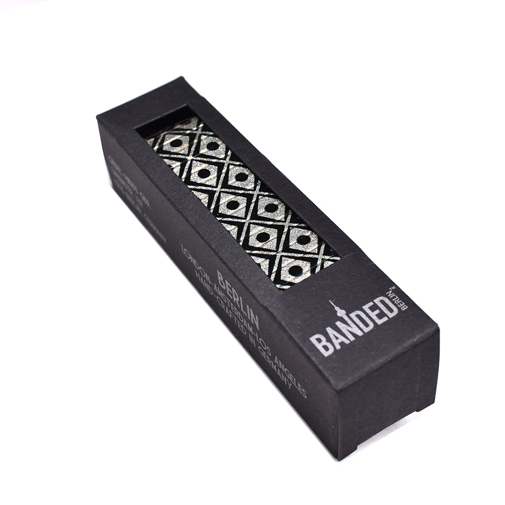 Cats Eye Metallic - A new take on the "Cats Eye" style introduced last Summer which instantly became a fan favorite. Add this to your rotation of bandeds and its sure to be one of your favs. Goes with just about any look and can tone up or down an outfit in a snap. Definitely a show stopper AND a conversation starter.  Now available in our signature 23mm width.